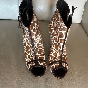 Manolo Blahnik animal print fur boots size 39 1/2 with a 4” heel.